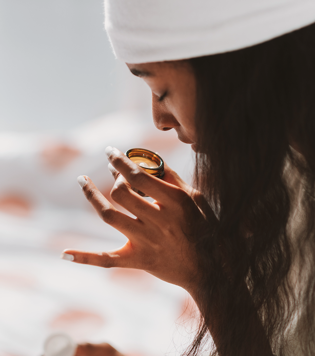 Person smelling an aroma